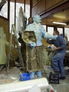 Bill helping with fibreglass backing mould for the Richie Benaud sculpture