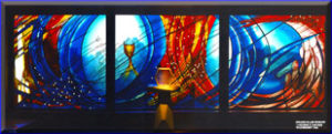 This stained glass window alludes to baptism, Eurcharist, community and reconciliation painted and etched glass, 11m x 3m, St. Bernadettes Castle Hill