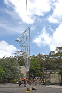 “Uniting A Nation” Wave being craned to main sculpture