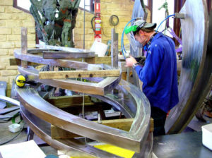 “Flowering Streams” Working on stainless steel structural water feature