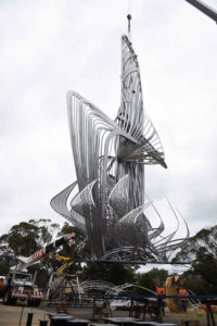 "Uniting A Nation" being craned to ground