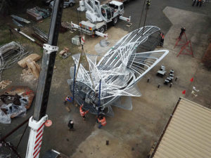 "Uniting A Nation" being craned to ground