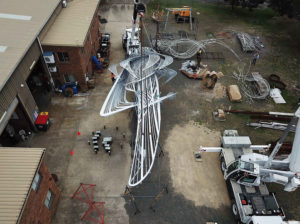 "Uniting A Nation" being craned to ground