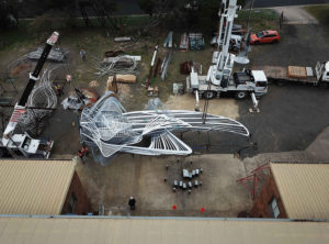 "Uniting A Nation" being craned to ground